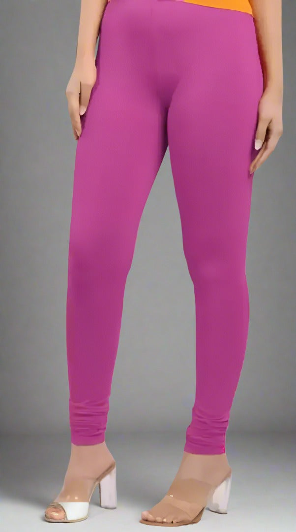 Enhance your wardrobe with our stylish and comfortable Polyester Solid Leggings for women. Made with modern influences, these leggings offer a cool and chic look, while providing maximum comfort. Perfect for any occasion, these leggings are a must-have for the fashion-forward woman.